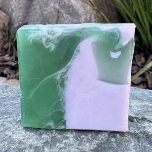 Front View of Serene Soap standing upright on rock in natural setting