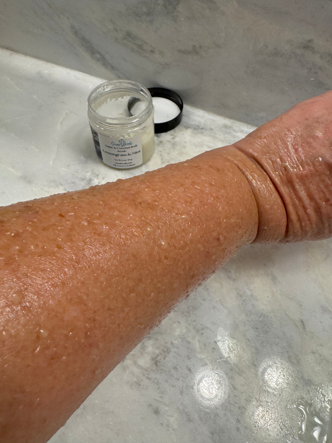 Damp forearm after using sugar scrub