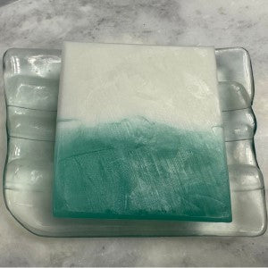 Cedar Mist Soap, close up of soap sitting flat on glass soap dish