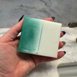 Cedar Mist Soap being held- scented with Eucalyptus and Texas Cedarwood essential oils