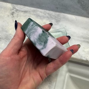 Side view of textured Serene Soap being held