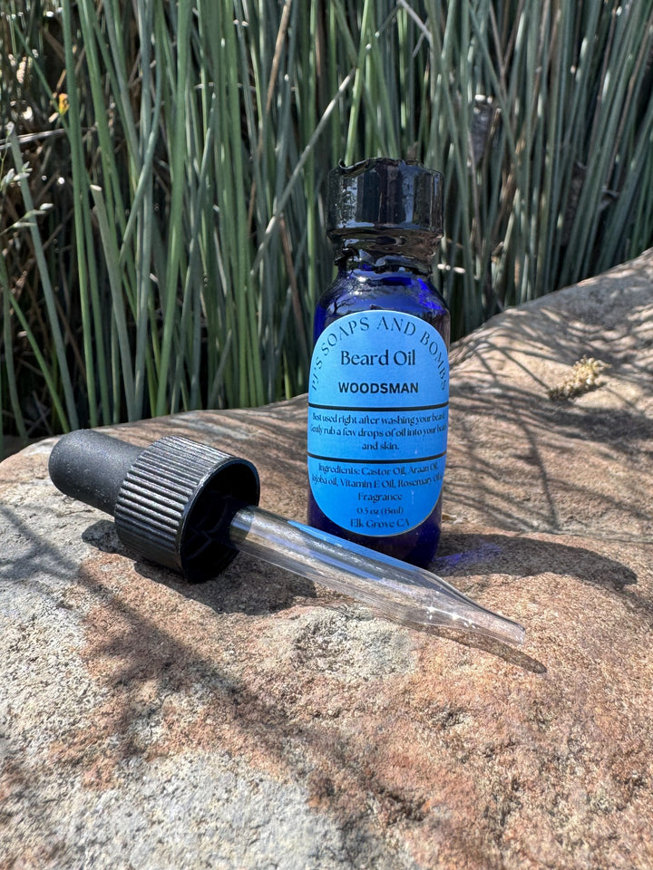 Woodsman Beard Oil and Dropper in outdoor setting