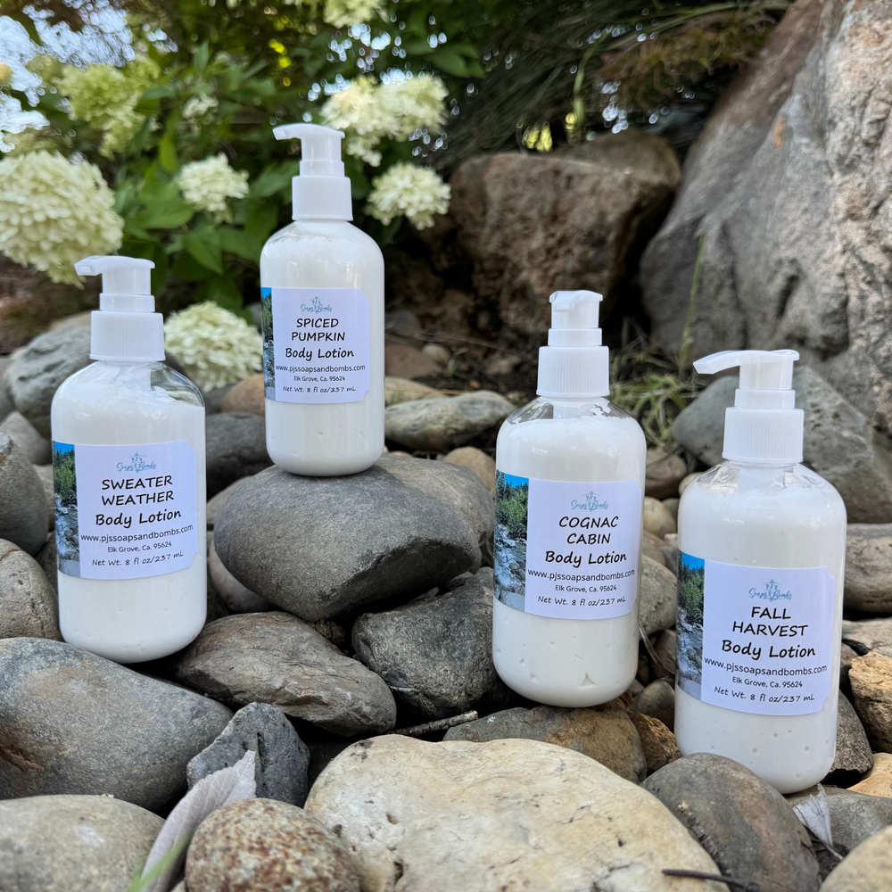 Fall Scented Lotions Sitting on Rocks