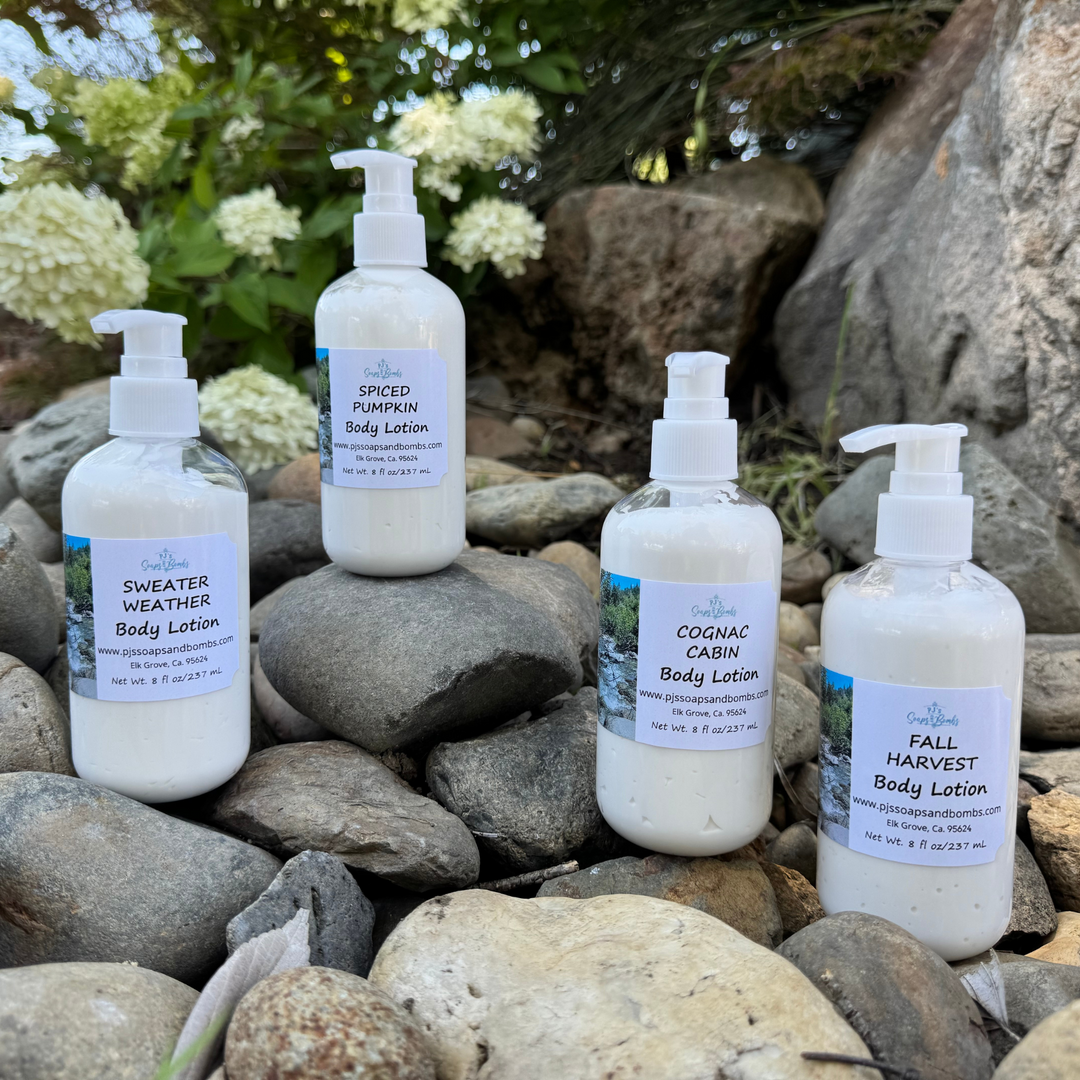 Fall Scented Lotions Sitting on Rocks