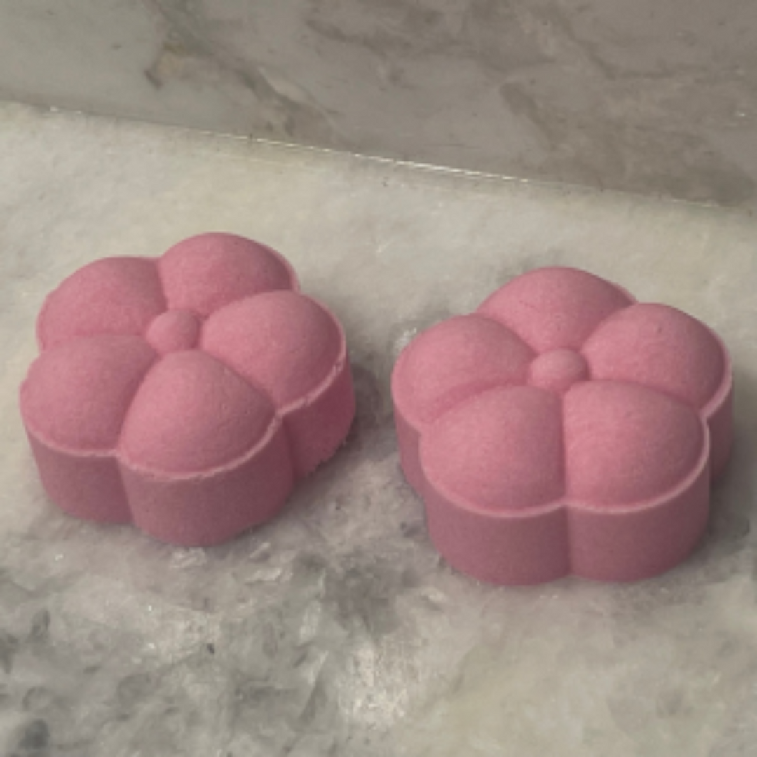 No More Sutffy Noses Pink Shower Steamers sitting on a counter