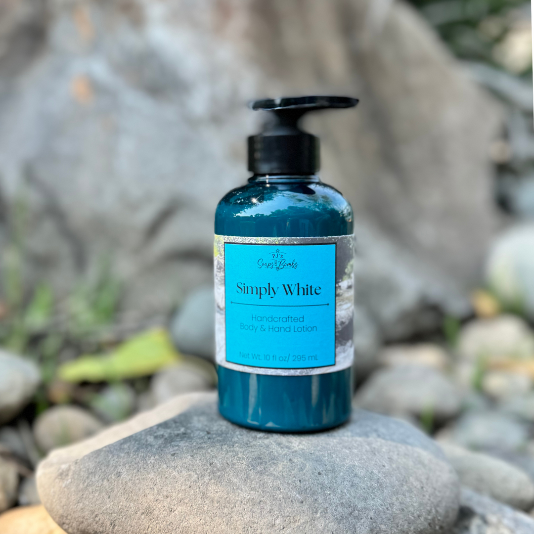Blue bottle of 'Simply White' lotion on a rock with a natural background